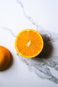orange slices in half. product and brand photography